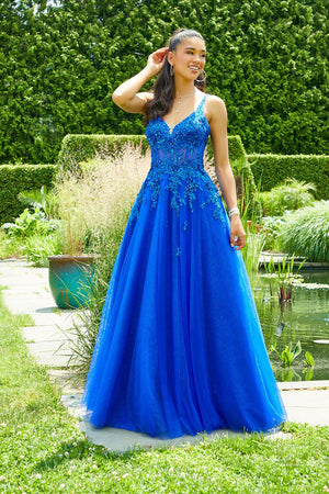 Morilee 47019 by Madeline Gardner dress images. Morilee 47019 is available in these colors: Purple, Green, Royal, White.