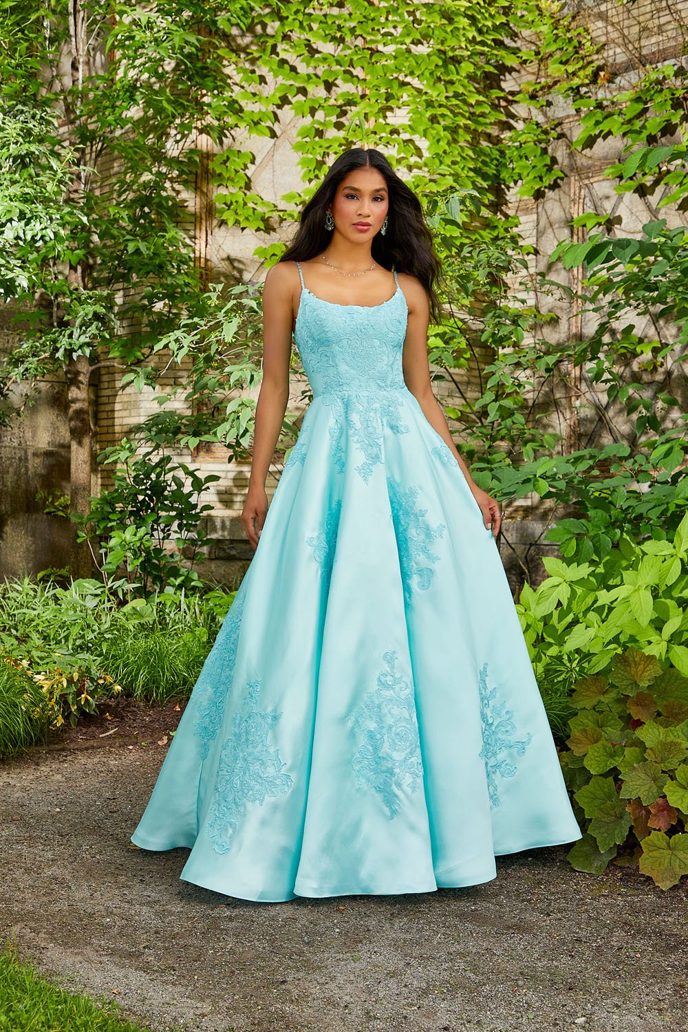 Morilee 47056 by Madeline Gardner dress images. Morilee 47056 is available in these colors: Black, Royal, Aqua, White.